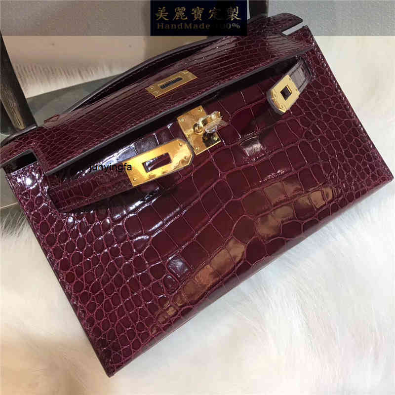 Bag designer handbags kely herme Handmade real crocodile skin Mini a generation of female hand Single Shoulder Messenger wine red, Beige
Bag designer handbags kely herme Handmade real crocodile skin Mini a generation of female hand Single Shoulder Messenger wine red, Beige