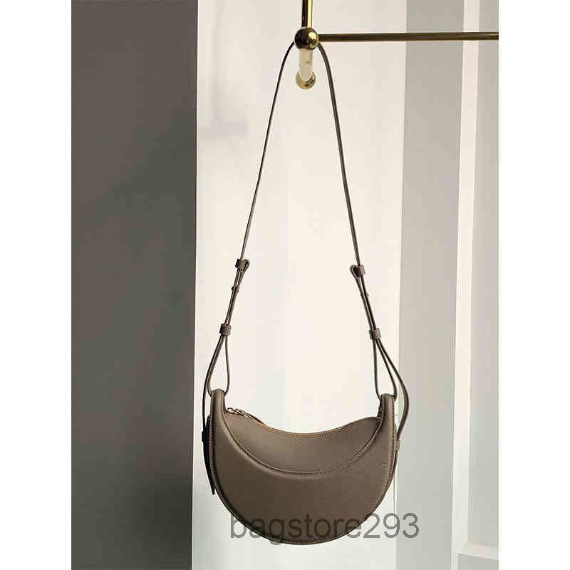 French Paris Niche Designer bag Highgrade Texture Messenger Crescent Bag Women's bags Leather Armpit Saddle, Brown
French Paris Niche Designer bag Highgrade Texture Messenger Crescent Bag Women's bags Leather Armpit Saddle, Brown