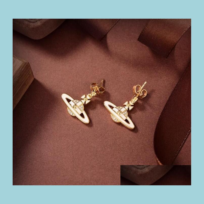 Stud Sell Like Cakes Earrings Stud Western Queen Planet Star Aura Luxury Jewelry Women Earring Designer Drop Deli Dhpvl
Stud Sell Like Cakes Earrings Stud Western Queen Planet Star Aura Luxury Jewelry Women Earring Designer Drop Deli Dhpvl