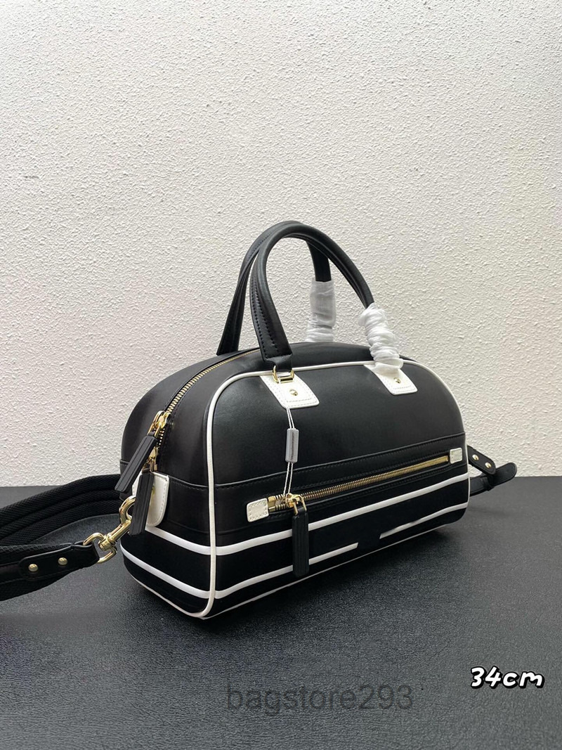 VIBE Zip Bowling Bag designers bags Smooth Calfskin Front Zipped Pocket Leather Shoulder Strap Luxurys Sports Handbag large beach bag handbags street tote 2022
VIBE Zip Bowling Bag designers bags Smooth Calfskin Front Zipped Pocket Leather Shoulder Strap Luxurys Sports Handbag large beach bag handbags street tote 2022