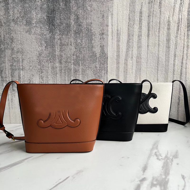 Fashion luxurys designer bag leather handbag triomphe bucket bag casual women's Shoulder Cross body bags, White
Fashion luxurys designer bag leather handbag triomphe bucket bag casual women's Shoulder Cross body bags, White