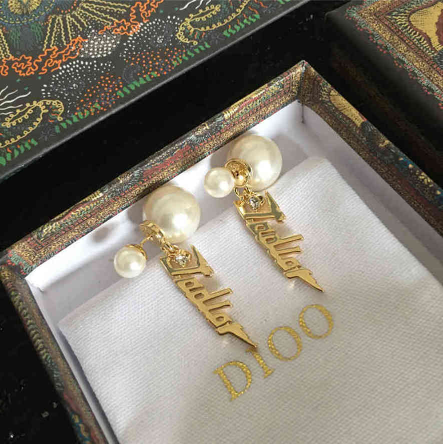 Stud design Gold earrings new irregular Pearl Earrings front and rear S925 silver needle
Stud design Gold earrings new irregular Pearl Earrings front and rear S925 silver needle