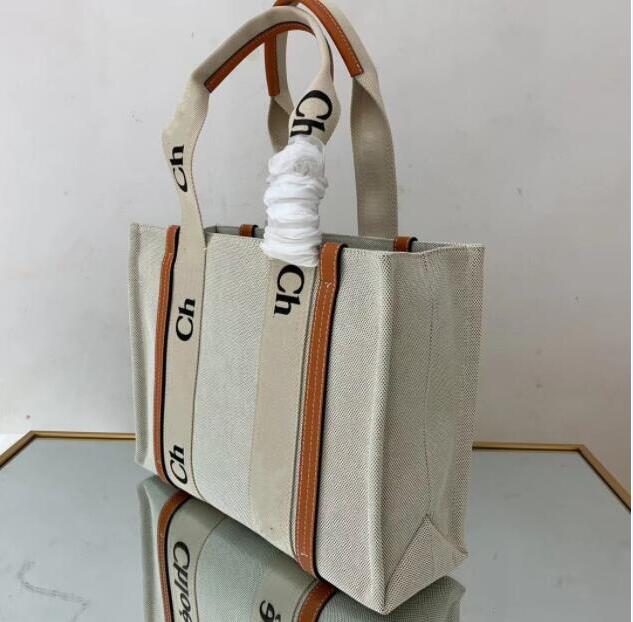 2023 Hot sell big shoulder shopping bag Clutch women large capacity beach canvas bag leisure chlose leather handbag bags with initial tag, Khaki 37x29x8cm
2023 Hot sell big shoulder shopping bag Clutch women large capacity beach canvas bag leisure chlose leather handbag bags with initial tag, Khaki 37x29x8cm