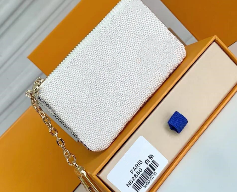 5 Colors Leather coin purse Fashion Men Women Key Pouch Brand card holders Mini Wallets Top Designer Zip pocket Small leather bags, Packing
5 Colors Leather coin purse Fashion Men Women Key Pouch Brand card holders Mini Wallets Top Designer Zip pocket Small leather bags, Packing