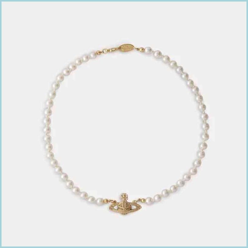 Pendant Necklaces Fashion Vivian West Queen Pearl Saturn Fl Diamond Necklace Classic Womens Jewelry Versatile Clavicle Lobs Dayupshop Dhesz
Pendant Necklaces Fashion Vivian West Queen Pearl Saturn Fl Diamond Necklace Classic Womens Jewelry Versatile Clavicle Lobs Dayupshop Dhesz