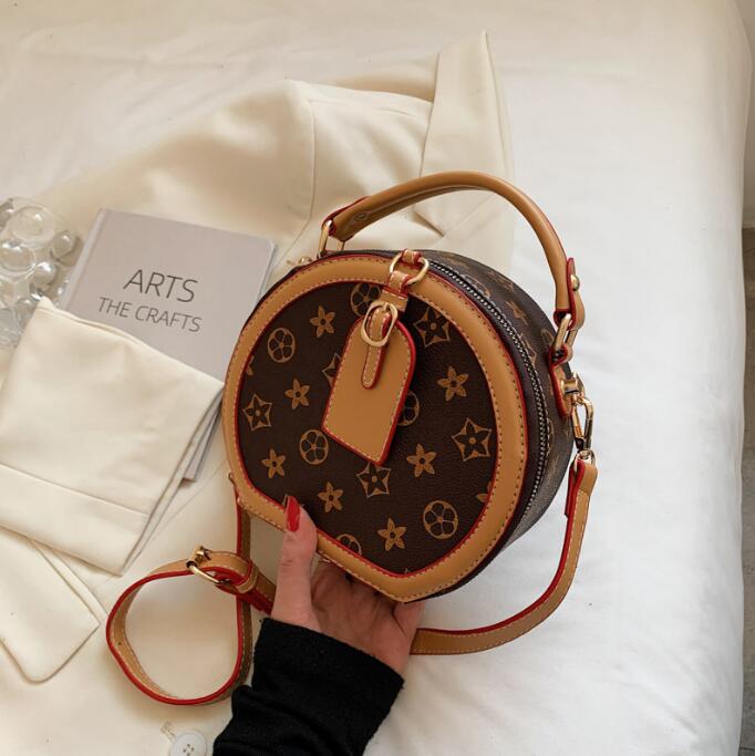 Fashion bags 2023 New Designer Handbags round printing slant cross bags portable for women
Fashion bags 2023 New Designer Handbags round printing slant cross bags portable for women