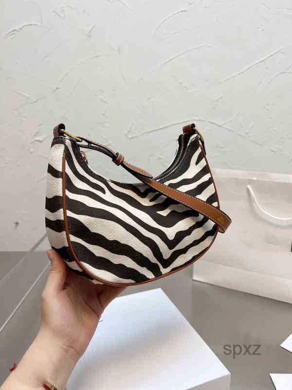 Evening Bags 2022 Bags Women Fashion Zebra Handbag Shoulder Leather Designer Crossbody Female Underarm Purses
Evening Bags 2022 Bags Women Fashion Zebra Handbag Shoulder Leather Designer Crossbody Female Underarm Purses