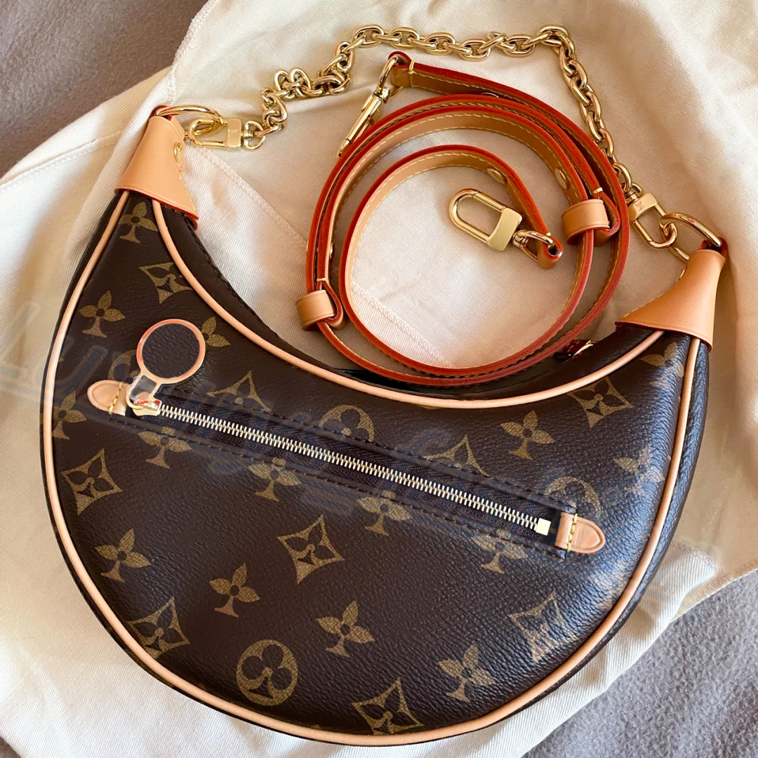 7A quality Luxury LOOP half moon Shoulder Bag leather famous clutch M81098 latest handbag Designer Women's men city two shoulder straps Metal fittings tote crossbody, Carton
7A quality Luxury LOOP half moon Shoulder Bag leather famous clutch M81098 latest handbag Designer Women's men city two shoulder straps Metal fittings tote crossbody, Carton