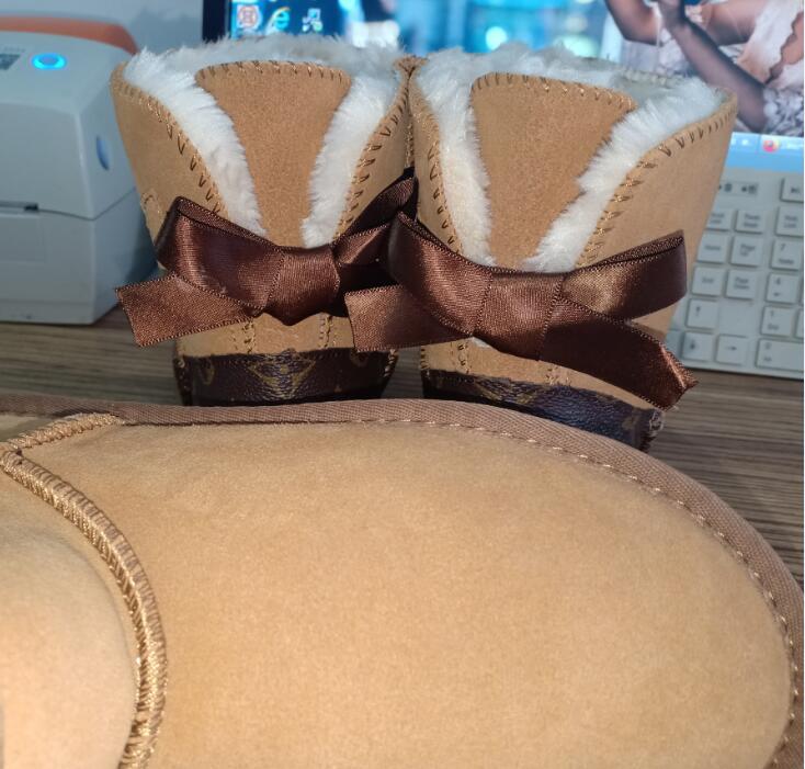 Genuine Leather L bow and U women snow boots Soft comfortable Sheepskin fur keep warm boot U3180 short bowknot style shoes Beautiful gift, Twilight/pink
Genuine Leather L bow and U women snow boots Soft comfortable Sheepskin fur keep warm boot U3180 short bowknot style shoes Beautiful gift, Twilight/pink