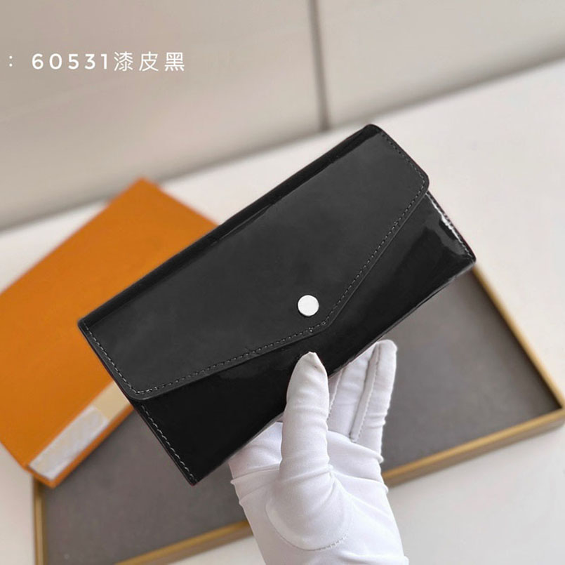 M60531 fashion designer woman hand wallet luxury leathers zipper HIGH QUALITY women long Patent classic coin purses wallets with box, Patent pink flower
M60531 fashion designer woman hand wallet luxury leathers zipper HIGH QUALITY women long Patent classic coin purses wallets with box, Patent pink flower