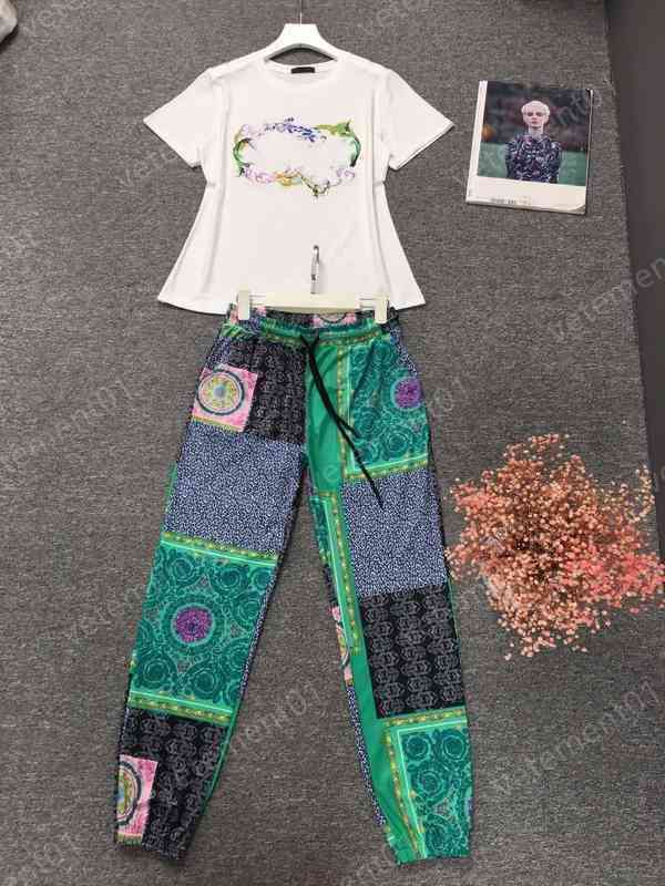 Womens Two Piece Pants Fashion Print Black Short Sleeve T-Shirt With Patch Panel Pants 2 Piece Sets Luxury Designer Tracksuits 0912
Womens Two Piece Pants Fashion Print Black Short Sleeve T-Shirt With Patch Panel Pants 2 Piece Sets Luxury Designer Tracksuits 0912