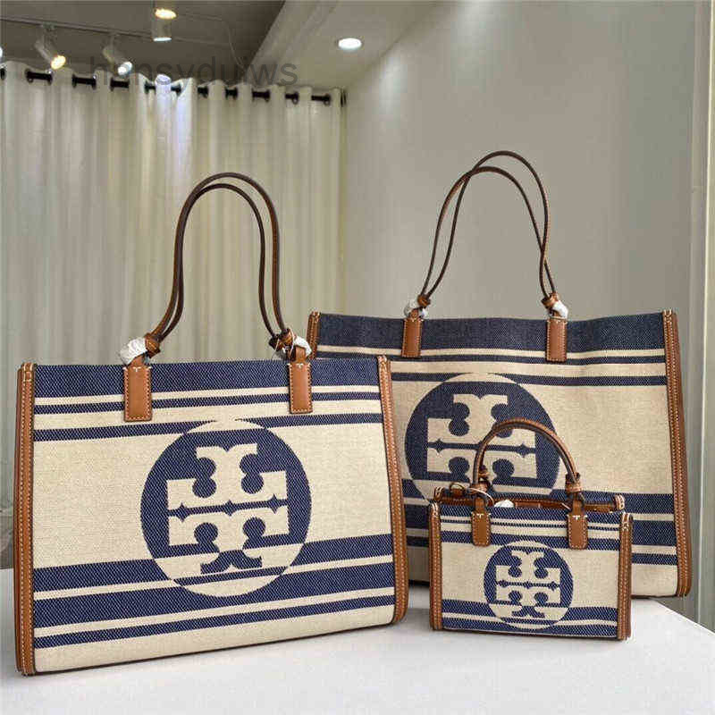 Designer Crossbody Bags Handbags T0rys bag Tote women's 2022 New Canvas Jacquard Stripe Ella Tote Womens 0078 Cow Leather Edge Single Shoulder Messenger Po, Blue and white stripes
Designer Crossbody Bags Handbags T0rys bag Tote women's 2022 New Canvas Jacquard Stripe Ella Tote Womens 0078 Cow Leather Edge Single Shoulder Messenger Po, Blue and white stripes
