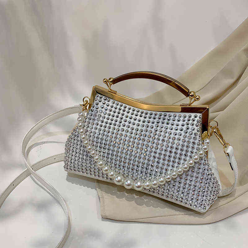 Luxury Evening Bags Pearl Hand Makeup Bag Designer Geplooide Shell Tas Voor Vrouwen Clutch Portemonnees Crossbody Lange Riem Shopping Purse 230509bj, Black
Luxury Evening Bags Pearl Hand Makeup Bag Designer Geplooide Shell Tas Voor Vrouwen Clutch Portemonnees Crossbody Lange Riem Shopping Purse 230509bj, Black