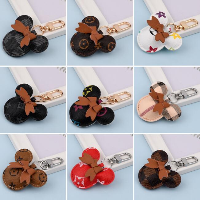Mouse Design Car Keychain Favor Flower Bag Pendant Charm Jewelry Keyring Holder for Men Gift Fashion PU Leather Animal Key Chain Accessories 18 colors
Mouse Design Car Keychain Favor Flower Bag Pendant Charm Jewelry Keyring Holder for Men Gift Fashion PU Leather Animal Key Chain Accessories 18 colors