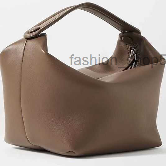 The row cowhide lunch bag les Bains Tote extremely simple style handbag Womens European American style
The row cowhide lunch bag les Bains Tote extremely simple style handbag Womens European American style