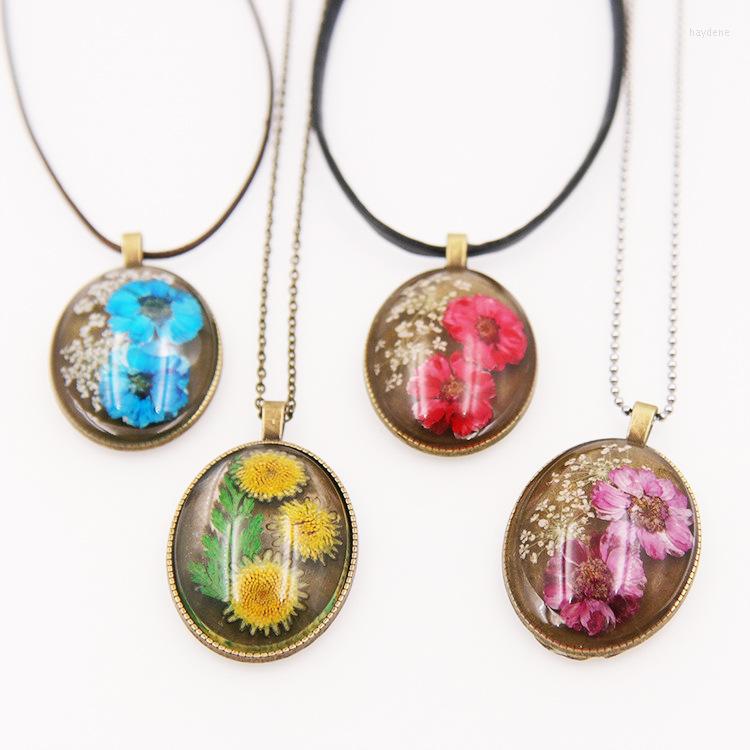 Pendant Necklaces Real Flowers Resin Women Necklace Fashion Heart JewelryPendant
Pendant Necklaces Real Flowers Resin Women Necklace Fashion Heart JewelryPendant