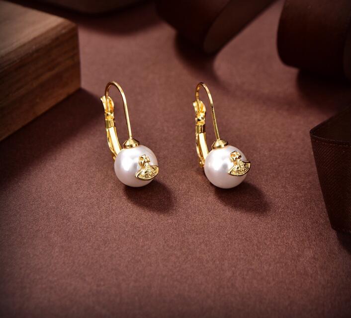 Vogue Simple lady Pearl Diamonds Earrings Stud Western Queen Planet star aura High Quality Luxury Jewelry Women Saturn Earring Designer Jewelry Gifts
Vogue Simple lady Pearl Diamonds Earrings Stud Western Queen Planet star aura High Quality Luxury Jewelry Women Saturn Earring Designer Jewelry Gifts