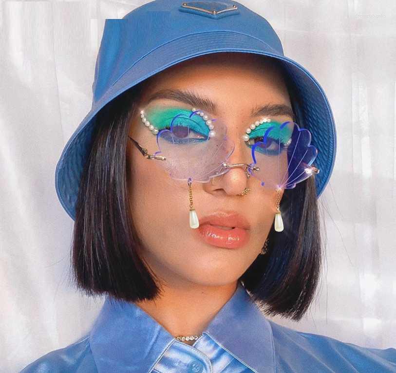 Sunglasses Unique Shell Shape Pearl Pendant Women Candy Colors Beach Glasses Oversized Rimless Female Oculos UV400Sunglasses
Sunglasses Unique Shell Shape Pearl Pendant Women Candy Colors Beach Glasses Oversized Rimless Female Oculos UV400Sunglasses