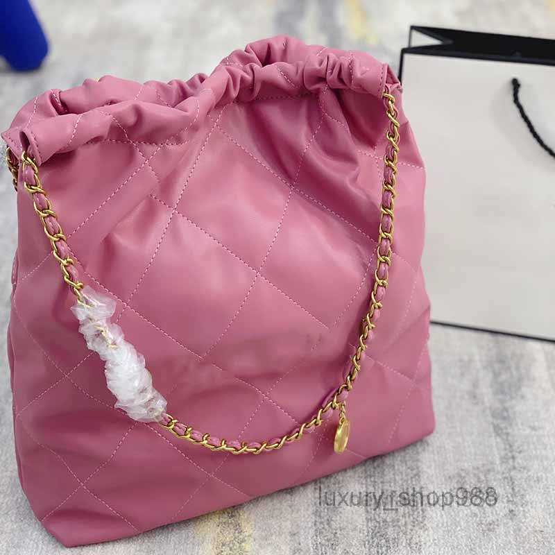 shopping Totes Designer 39c Vintage Women Totes Bags Solid Color Leather Designer Bag Large Capacity Shopping Handbag Golden Pendant Chain C
shopping Totes Designer 39c Vintage Women Totes Bags Solid Color Leather Designer Bag Large Capacity Shopping Handbag Golden Pendant Chain C