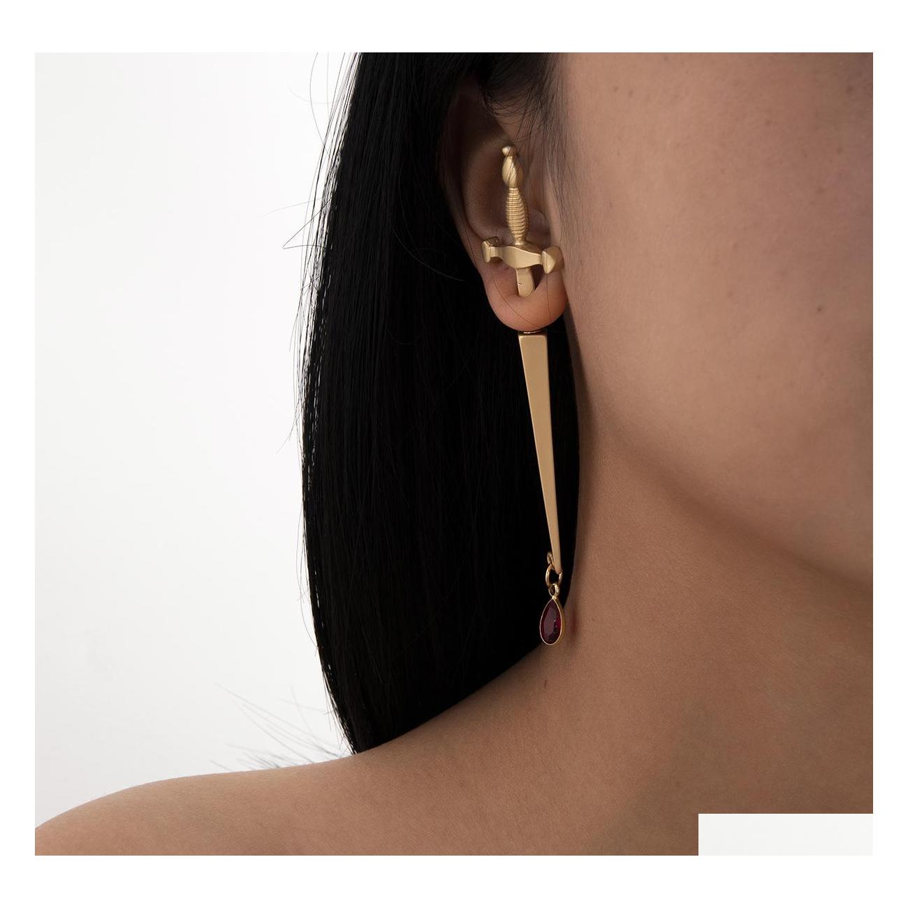 Stud Europe Fashion Jewelry Single Piece Long Sword Stud Earring Cool Hiphop Red Drop Cross Earrings Delivery Dhhod
Stud Europe Fashion Jewelry Single Piece Long Sword Stud Earring Cool Hiphop Red Drop Cross Earrings Delivery Dhhod