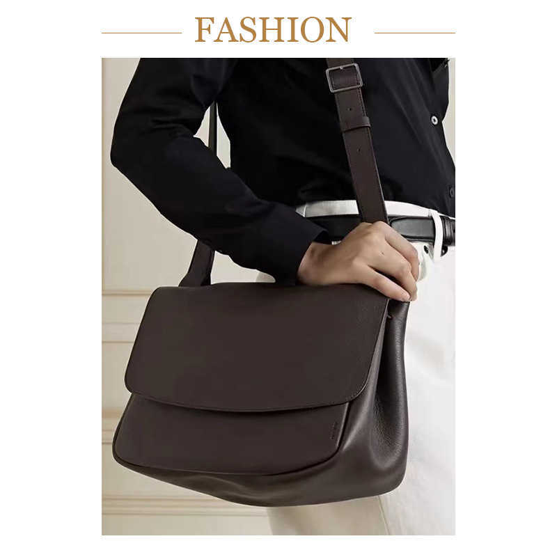 The Row Bag Designer High end shoulder large capacity messenger female Damei Bai Baihe leather clamshell of same style, Black
The Row Bag Designer High end shoulder large capacity messenger female Damei Bai Baihe leather clamshell of same style, Black
