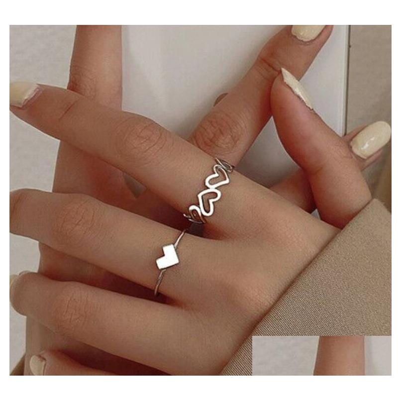 Band Rings 2Pcs/Set Women Fashion Simple Heart Band Rings Design Hollow Finger Ring For Girls Jewelry Gift Drop Delivery 2021 Dhhll
Band Rings 2Pcs/Set Women Fashion Simple Heart Band Rings Design Hollow Finger Ring For Girls Jewelry Gift Drop Delivery 2021 Dhhll