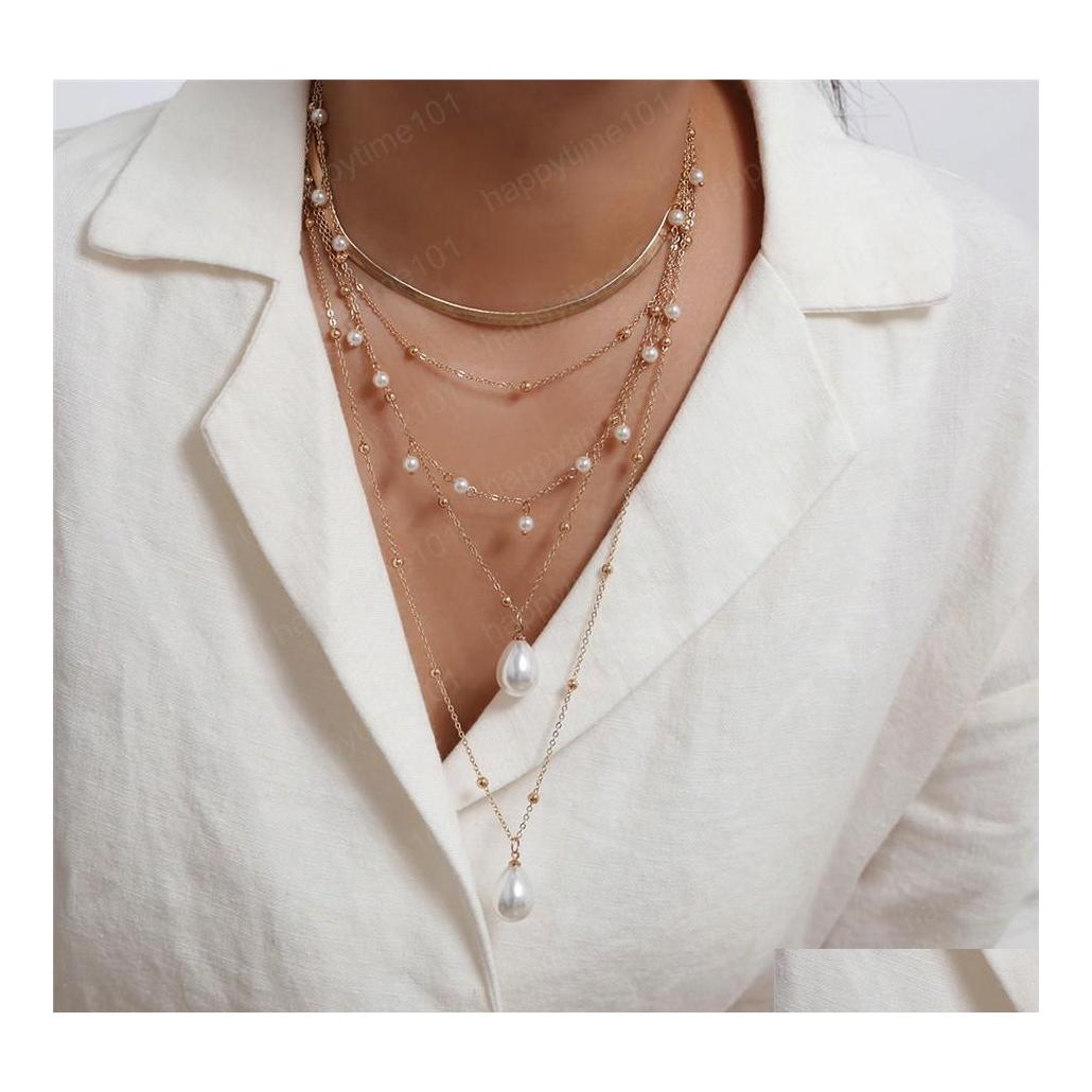 Pendant Necklaces Bohemian Layered Necklace Imitation Pearl Pendant Gold Color Chain Choker For Women Fashion Jewelry Gift Drop Deli Dhz9X
Pendant Necklaces Bohemian Layered Necklace Imitation Pearl Pendant Gold Color Chain Choker For Women Fashion Jewelry Gift Drop Deli Dhz9X