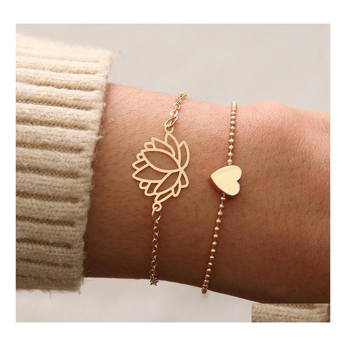 Charm Bracelets Fashion Jewelry Double Layer Bracelet Hollow Out Flower Heart Pendant Bracelets Drop Delivery Dhkrf
Charm Bracelets Fashion Jewelry Double Layer Bracelet Hollow Out Flower Heart Pendant Bracelets Drop Delivery Dhkrf