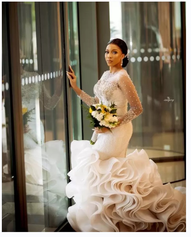 Modern Pearls Beaded Mermaid Wedding Dresses with Lace Appliques Court Train Long Sleeves Tiered Rufffles Bridal Gown Jewel Neckline Arabic African Lu