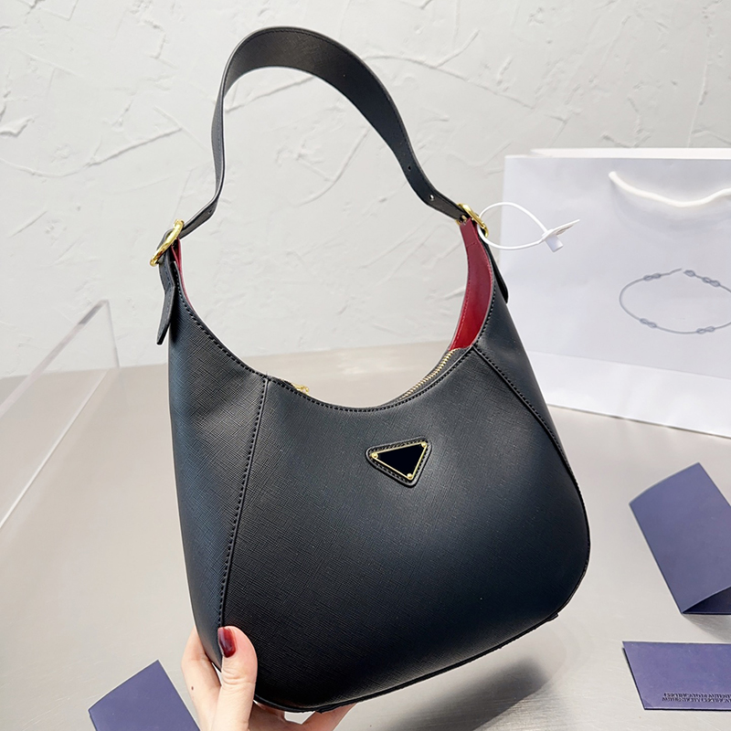 Women Designer Hobo Underarm Shoulder Bag Italy Milano Luxury Brand P Nappa Leather Red Lining Half Moon Bags Lady Adjustable Strap Small Zippered Evening Bags
Women Designer Hobo Underarm Shoulder Bag Italy Milano Luxury Brand P Nappa Leather Red Lining Half Moon Bags Lady Adjustable Strap Small Zippered Evening Bags