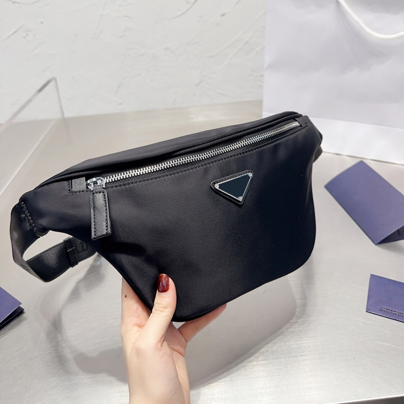 Designer Fanny Pack Waist Bags Nylon Designers Re Nylon Bumbag Black Waistpacks Women Mens Packs Men Fannypack Womens Belt Chest Bags 1201
Designer Fanny Pack Waist Bags Nylon Designers Re Nylon Bumbag Black Waistpacks Women Mens Packs Men Fannypack Womens Belt Chest Bags 1201