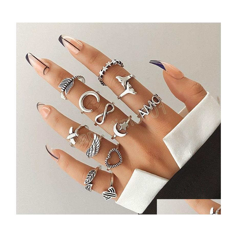Band Rings Moon Tail Wing Ring Vintage Woman Men Fashion Heart Leaf Rings Set Arrow Infinite Loop Jewelry Gift Drop Delivery Dh5Ya
Band Rings Moon Tail Wing Ring Vintage Woman Men Fashion Heart Leaf Rings Set Arrow Infinite Loop Jewelry Gift Drop Delivery Dh5Ya
