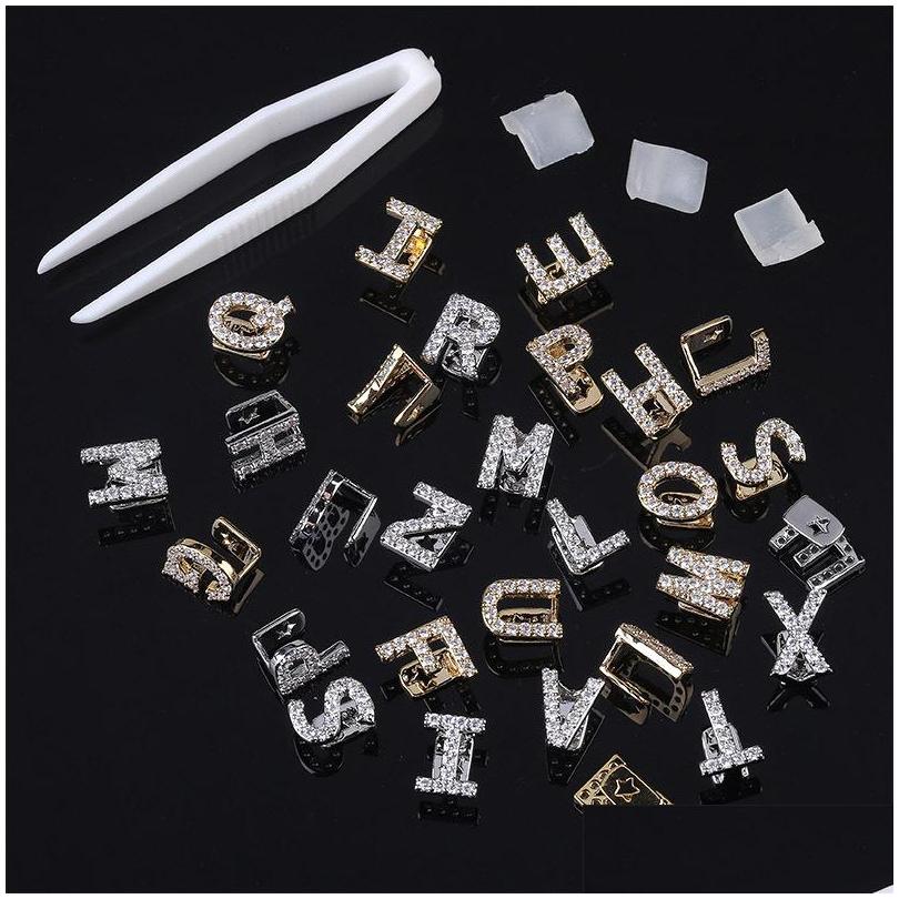 Grillz Dental Grills English Letter Teeth Grillz Hip Hop Zircon Copper Single Plated Gold Men Woman Dents Grillzs Fl Drill Braces 4 Dh6Yf
Grillz Dental Grills English Letter Teeth Grillz Hip Hop Zircon Copper Single Plated Gold Men Woman Dents Grillzs Fl Drill Braces 4 Dh6Yf