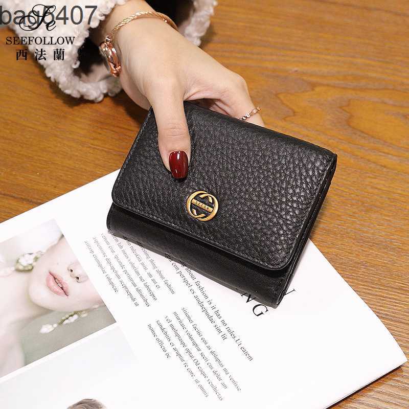 Luxury Design Bag Ladies Purseshop Wholesale and Retail 2023 New Wallet Women's Short Leather Folding Fashion Simple Cowhide Three Fold Multi-functional Clip, Black 
Luxury Design Bag Ladies Purseshop Wholesale and Retail 2023 New Wallet Women's Short Leather Folding Fashion Simple Cowhide Three Fold Multi-functional Clip, Black