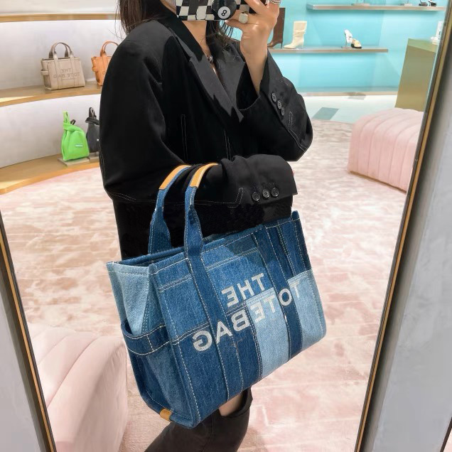 Designer Women's The Traveler tote bag PM MM GM Canvas Denim Large Capacity Shopping pocket Lady Shoulder Crossbody Luxury Fashion Casual Totes handbag, Black white binding
Designer Women's The Traveler tote bag PM MM GM Canvas Denim Large Capacity Shopping pocket Lady Shoulder Crossbody Luxury Fashion Casual Totes handbag, Black white binding