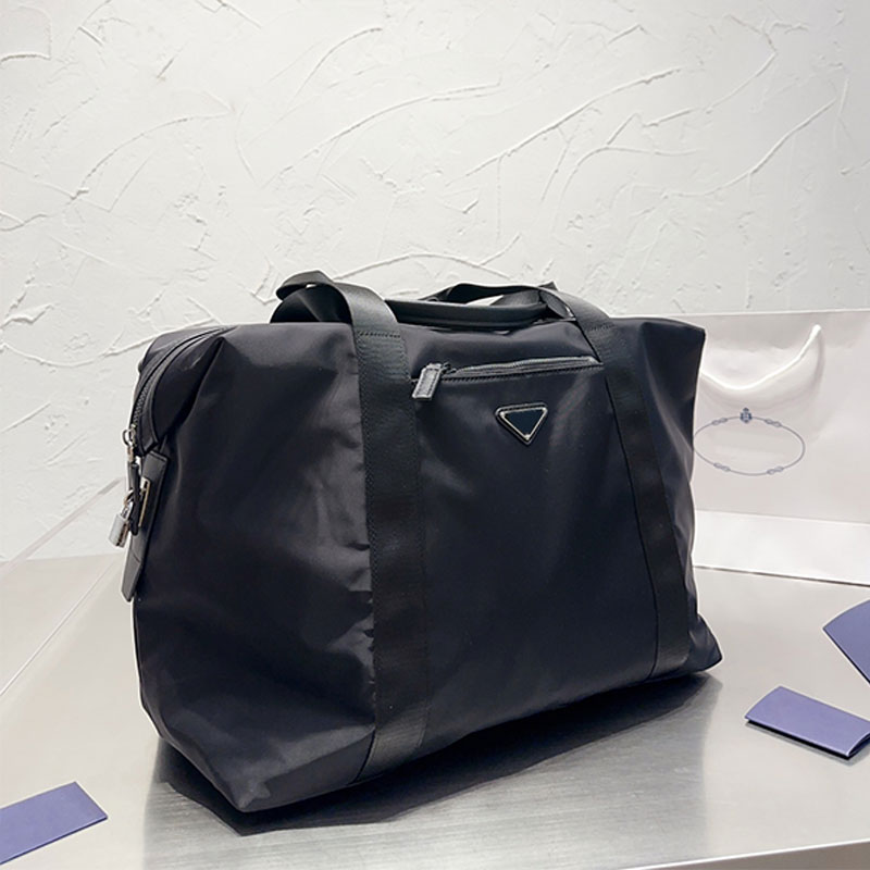 Black Nylon Duffle Bag Large Capacity Totes Luggage Bags Fashion Metal Triangle Men Women Shoulder Travel Sports Bags LWaterproof Duffel Handbag with Lock
Black Nylon Duffle Bag Large Capacity Totes Luggage Bags Fashion Metal Triangle Men Women Shoulder Travel Sports Bags LWaterproof Duffel Handbag with Lock