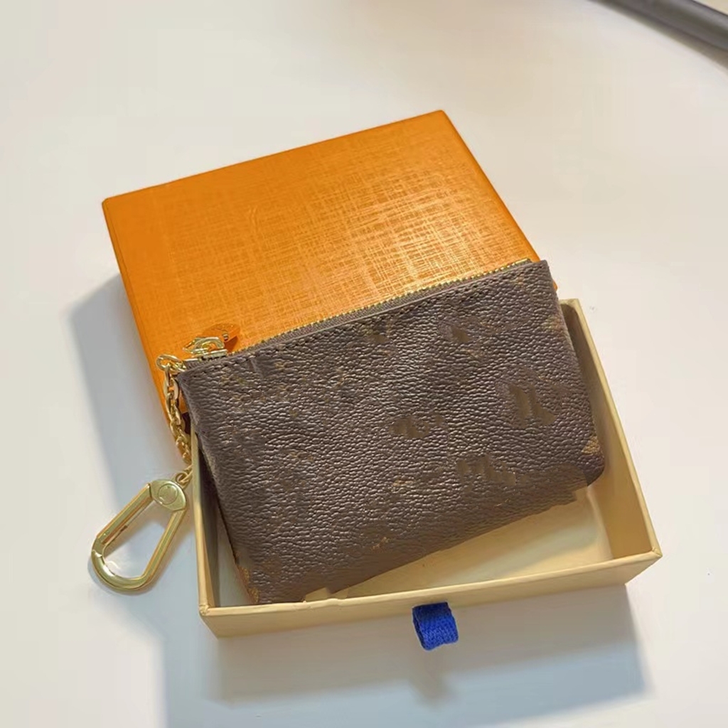 Fashion luxury purse classic key ultra thin change holding mini zipper small hanging bag, Brown
Fashion luxury purse classic key ultra thin change holding mini zipper small hanging bag, Brown