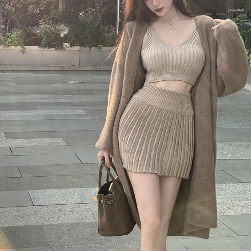 Women's Knits 2022 Winter High Street Loose Solid Color Long-sleeved Cardigan Women Sexy Camisole Pleated A-line Skirt Three-piece Suit
Women's Knits 2022 Winter High Street Loose Solid Color Long-sleeved Cardigan Women Sexy Camisole Pleated A-line Skirt Three-piece Suit
