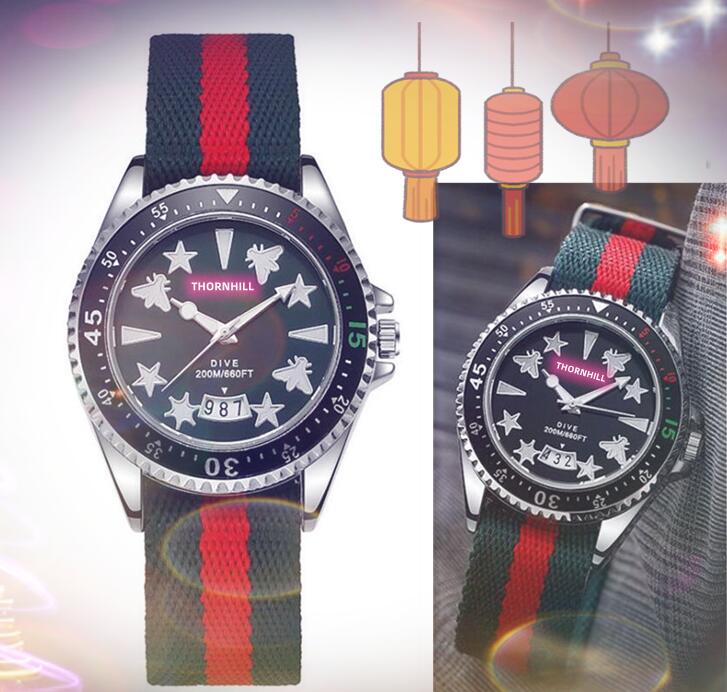 Luxury lovers bee star big quartz watches men and women couples diamonds ring red blue nylon leather belt fashion gold ladies auto date time clock watch gifts, As pic
Luxury lovers bee star big quartz watches men and women couples diamonds ring red blue nylon leather belt fashion gold ladies auto date time clock watch gifts, As pic