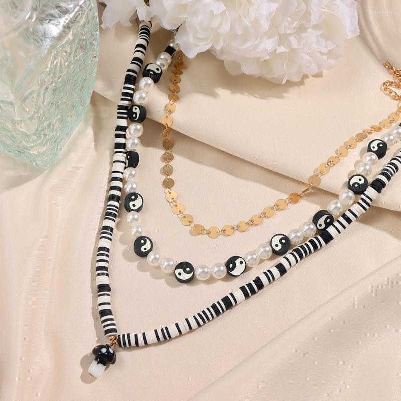 Chains JUST FEEL Black White Yin Yang Clay Beads Pearl Necklace For Women Multi-layer Mushroom Pendant Metal Sequins Jewelry
Chains JUST FEEL Black White Yin Yang Clay Beads Pearl Necklace For Women Multi-layer Mushroom Pendant Metal Sequins Jewelry