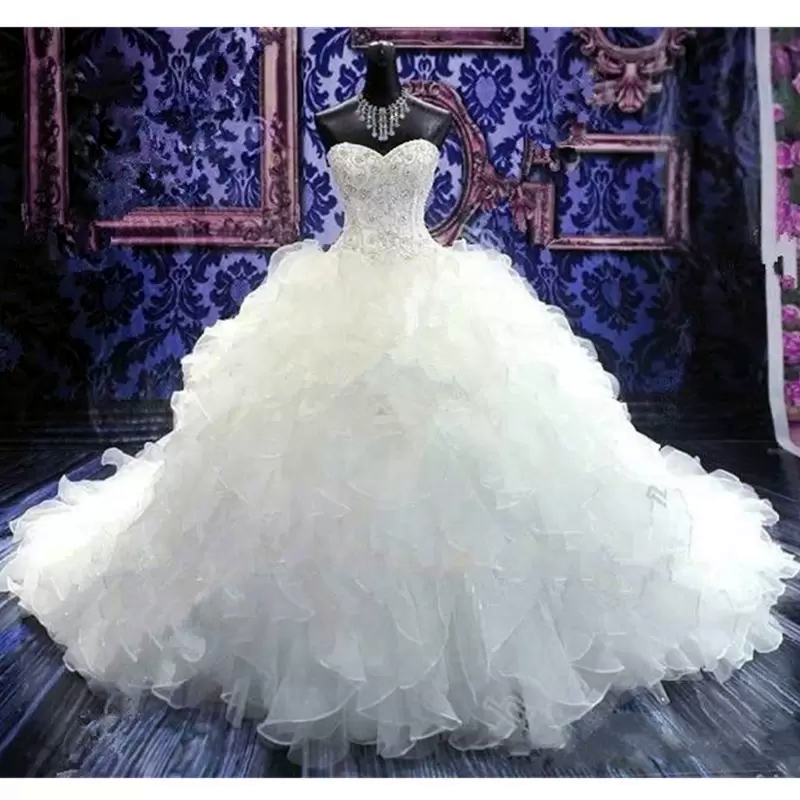 Dubai Arabic Ball Gown Wedding Dresses Ruffles Tiered Gorgeous Plus Size Sweetheart Backless Chapel Train Bridal Gowns Bling Luxury Beading Sequins Cr