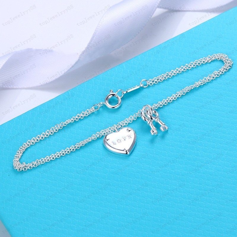 Fashion key tag Chain necklace luxury designer classic heart set 925 girls Valentine's Day love gift jewelry wholesale and retail with box
Fashion key tag Chain necklace luxury designer classic heart set 925 girls Valentine's Day love gift jewelry wholesale and retail with box