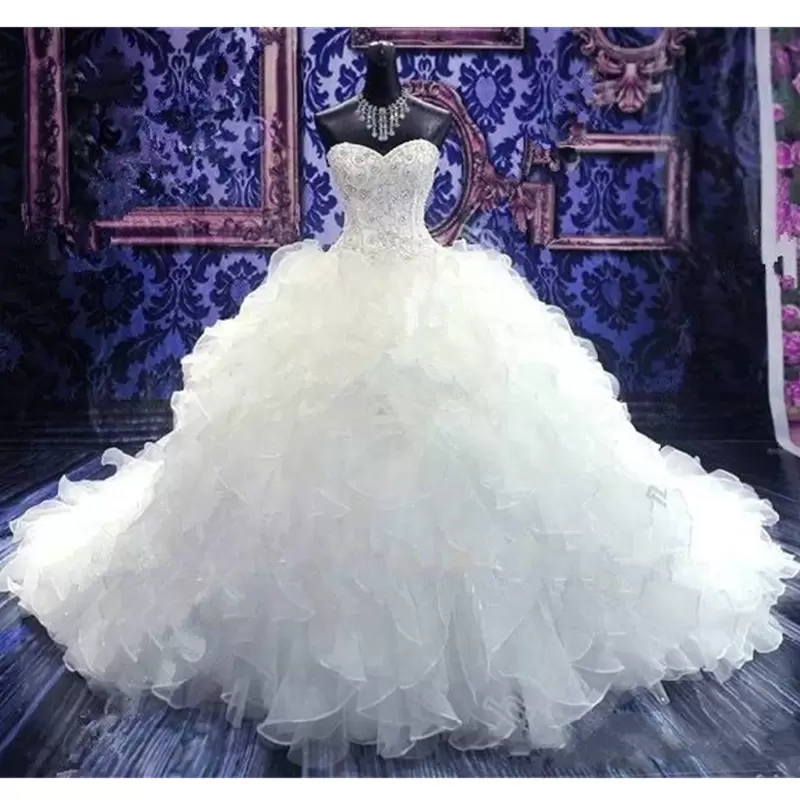 Dubai Arabic Ball Gown Wedding Dresses Ruffles Tiered Gorgeous Plus Size Sweetheart Backless Chapel Train Bridal Gowns Bling Luxury Beading Sequins Cr