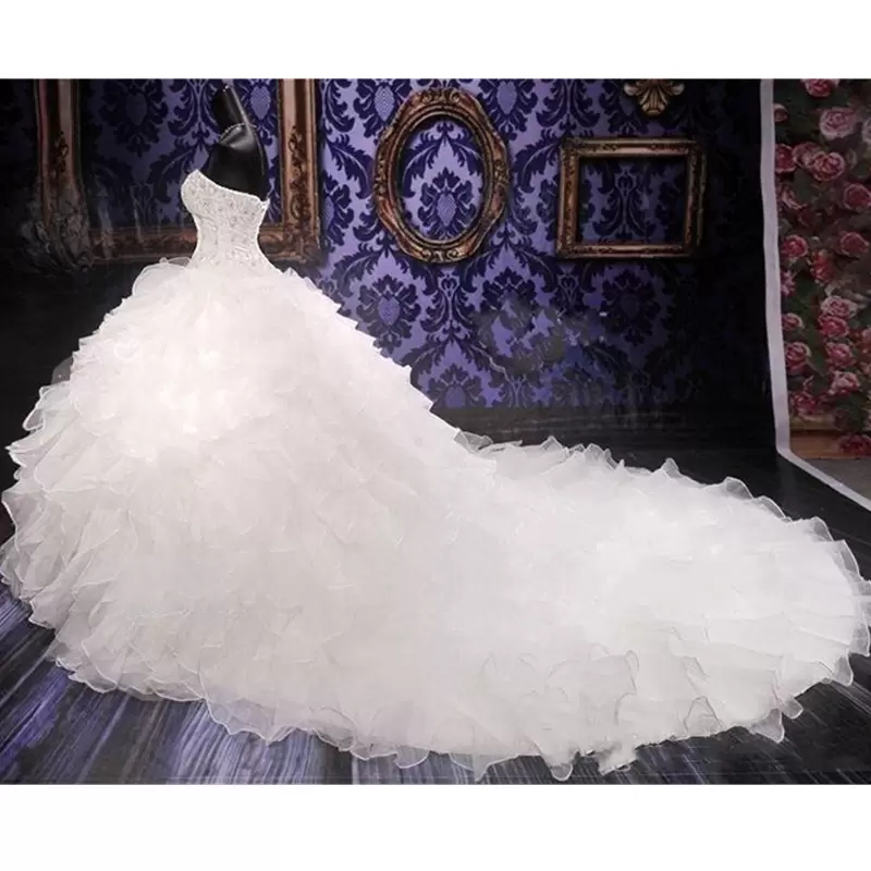 Dubai Arabic Ball Gown Wedding Dresses Ruffles Tiered Gorgeous Plus Size Sweetheart Backless Chapel Train Bridal Gowns Bling Luxury Beading Sequins Cr