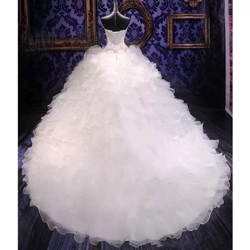 Dubai Arabic Ball Gown Wedding Dresses Ruffles Tiered Gorgeous Plus Size Sweetheart Backless Chapel Train Bridal Gowns Bling Luxury Beading Sequins Cr