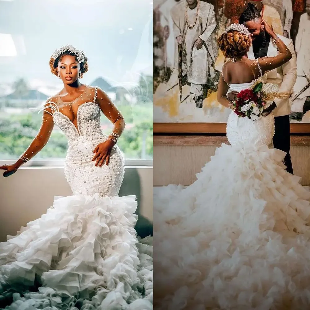Luxury African Mermaid Wedding Dresses Pearls Beading Ruffles Tiered Long Sleeves Bridal Gowns Illusion Jewel Neck Gorgeous Vestido de Novia Back Lace