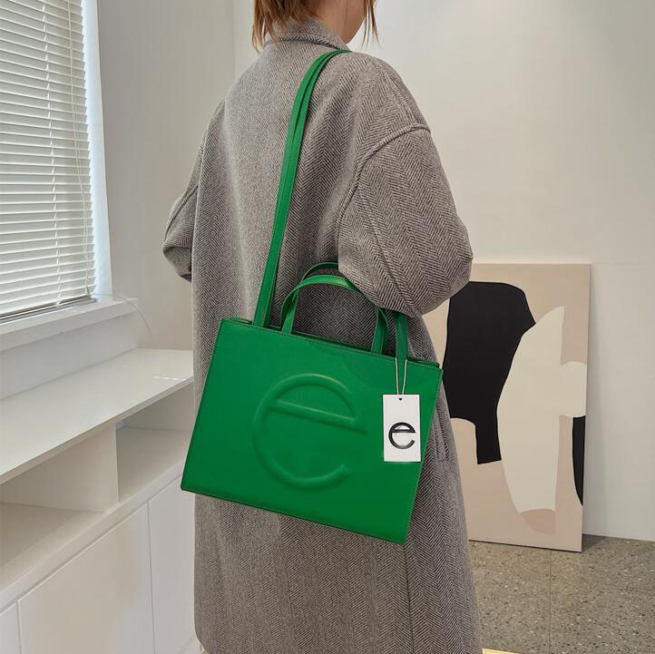 Catwalk style Telfars totes bags classic the tote bag luxury ONTHEGO handbag clutch leather shoulder crossbody package messenger bags size 32 24 10, Customize
Catwalk style Telfars totes bags classic the tote bag luxury ONTHEGO handbag clutch leather shoulder crossbody package messenger bags size 32 24 10, Customize