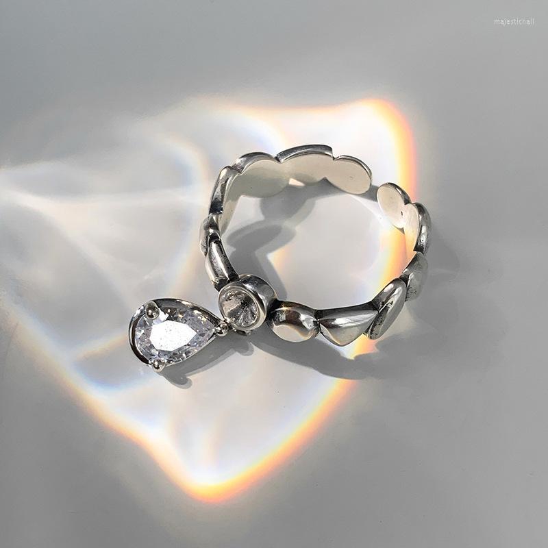 Wedding Rings Surflove Korean Version Water Drop Zircon Ring Female Retro Fashion Irregular Opening Adjustable
Wedding Rings Surflove Korean Version Water Drop Zircon Ring Female Retro Fashion Irregular Opening Adjustable