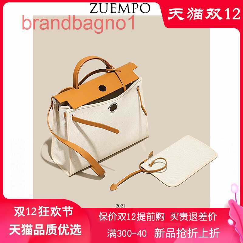 Herme Kely Designer Bags for Women online store Cowhide with canvas bag leather 31 college style portable women's one shoulder dia, Beibai coarse grain trumpet
Herme Kely Designer Bags for Women online store Cowhide with canvas bag leather 31 college style portable women's one shoulder dia, Beibai coarse grain trumpet