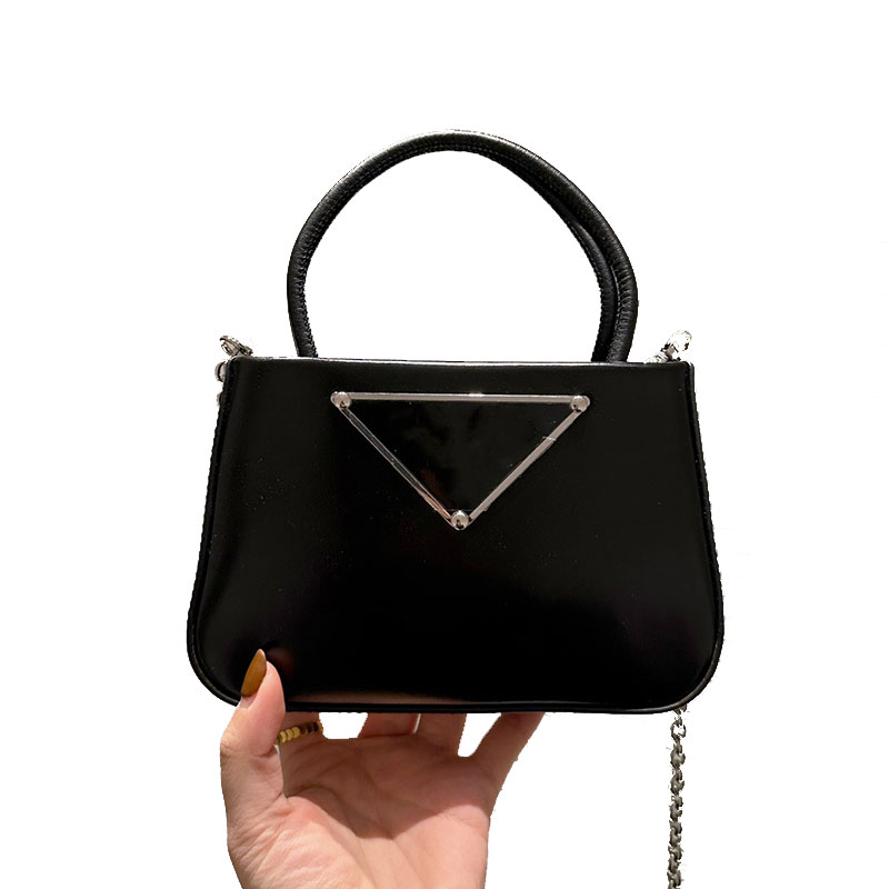 Classic Triangle Sign Crossbody Bags Handbags Italy Brand 5A Quality Genuine Leather Shoulder Bag Fashion Solid Color Women Totes Luxury Designers Chain Bag 18CM, Black
Classic Triangle Sign Crossbody Bags Handbags Italy Brand 5A Quality Genuine Leather Shoulder Bag Fashion Solid Color Women Totes Luxury Designers Chain Bag 18CM, Black